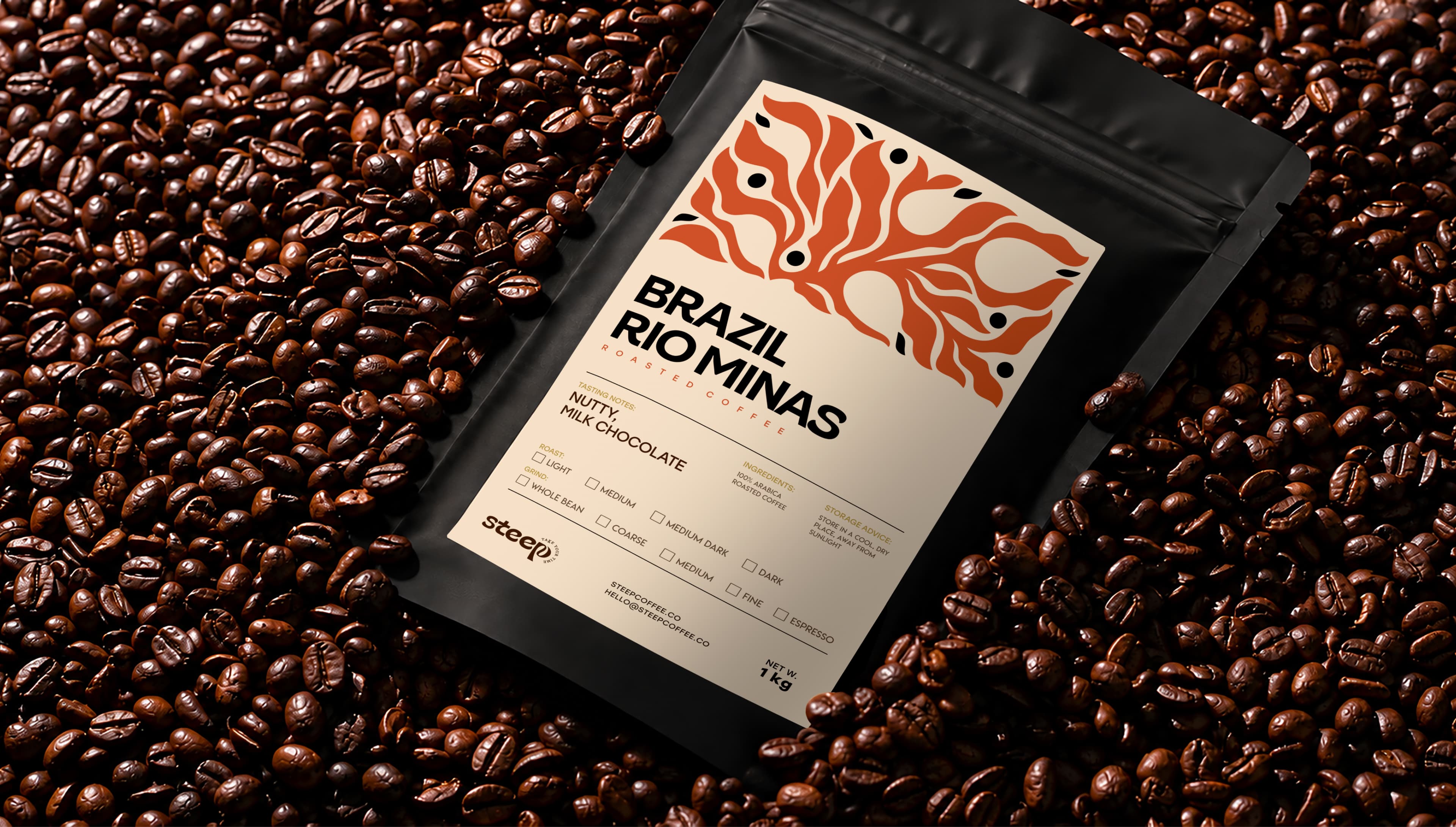 The Steep pouch lying on a bed of roasted coffee beans